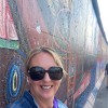 Image of Sarah wearing sun glasses and smiling